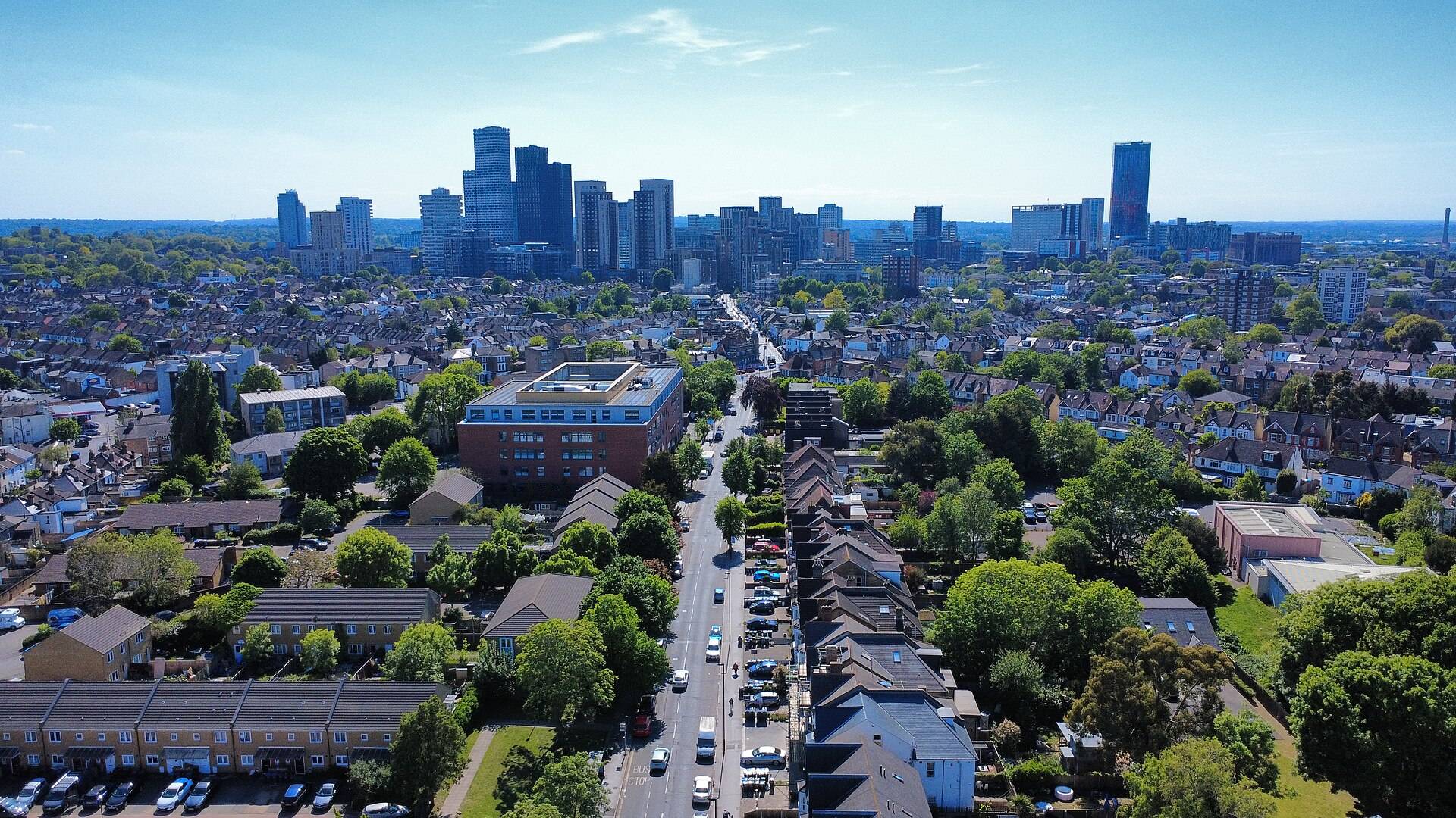 Terraced streets in the foreground and Croydon’s tower blocks behind, the housing mix behind most house removals in Croydon